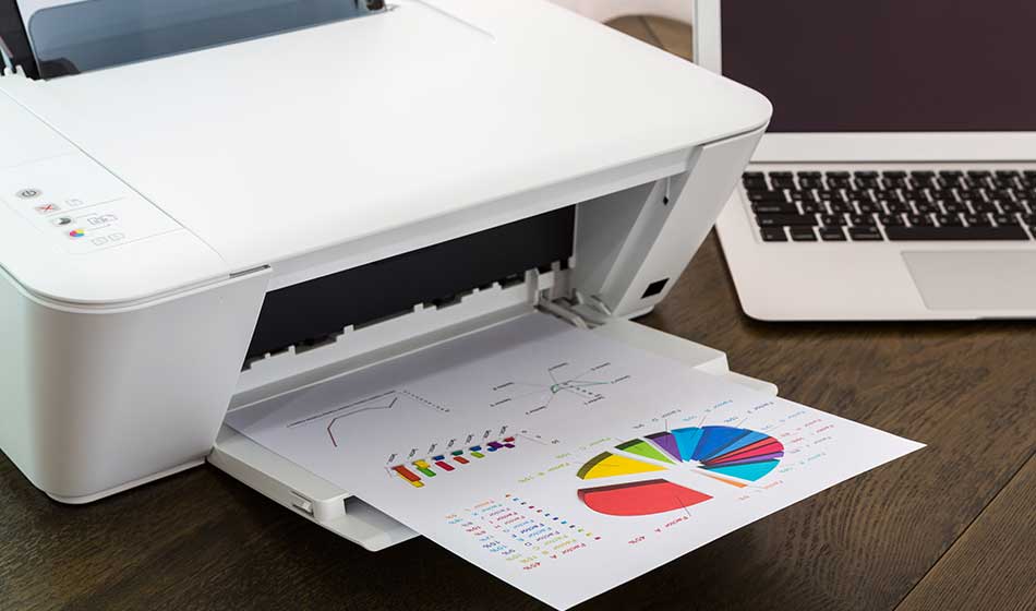 printer and Laptop on wood table