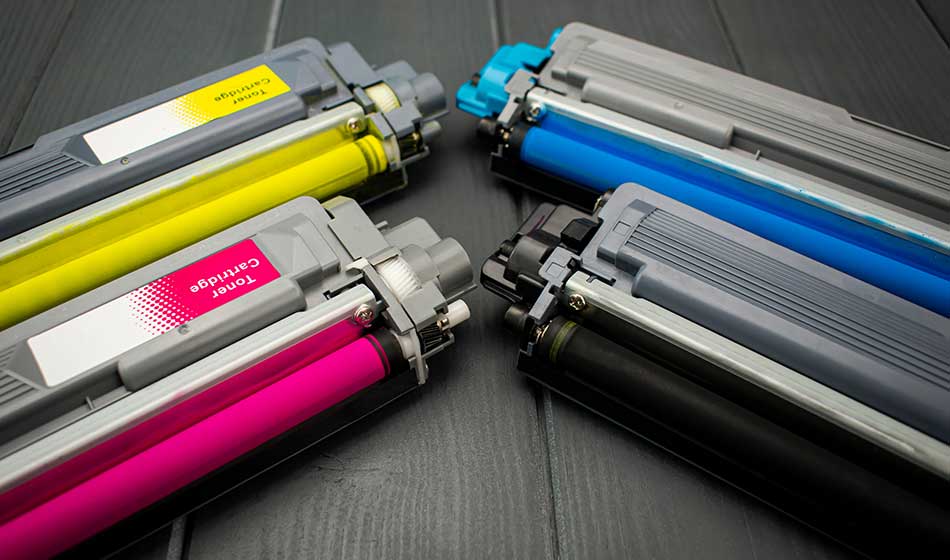 Cyan, magenta, amariyllo and black color toner rollers of a foreground color laser printer